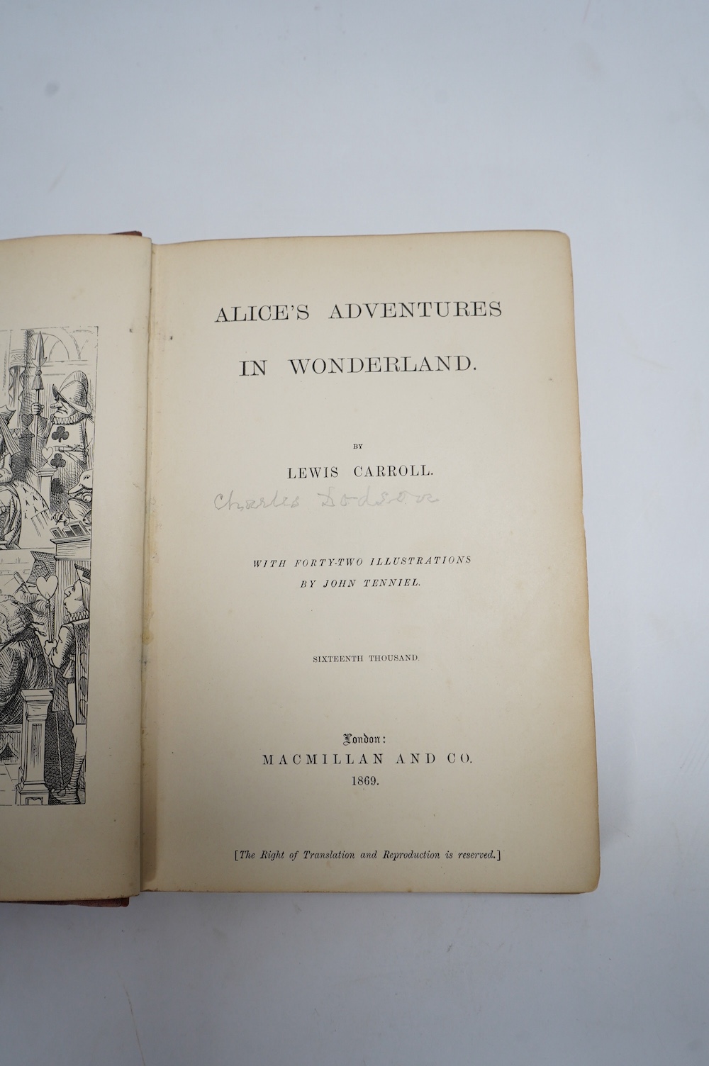 [Dodgson, Charles Lutwidge] - Alice's Adventures in Wonderland. By Lewis Carroll ... sixteenth thousand. frontis. and 41 engraved text illus. (by John Tenniel), half title; original gilt ruled and pictorial red cloth, so